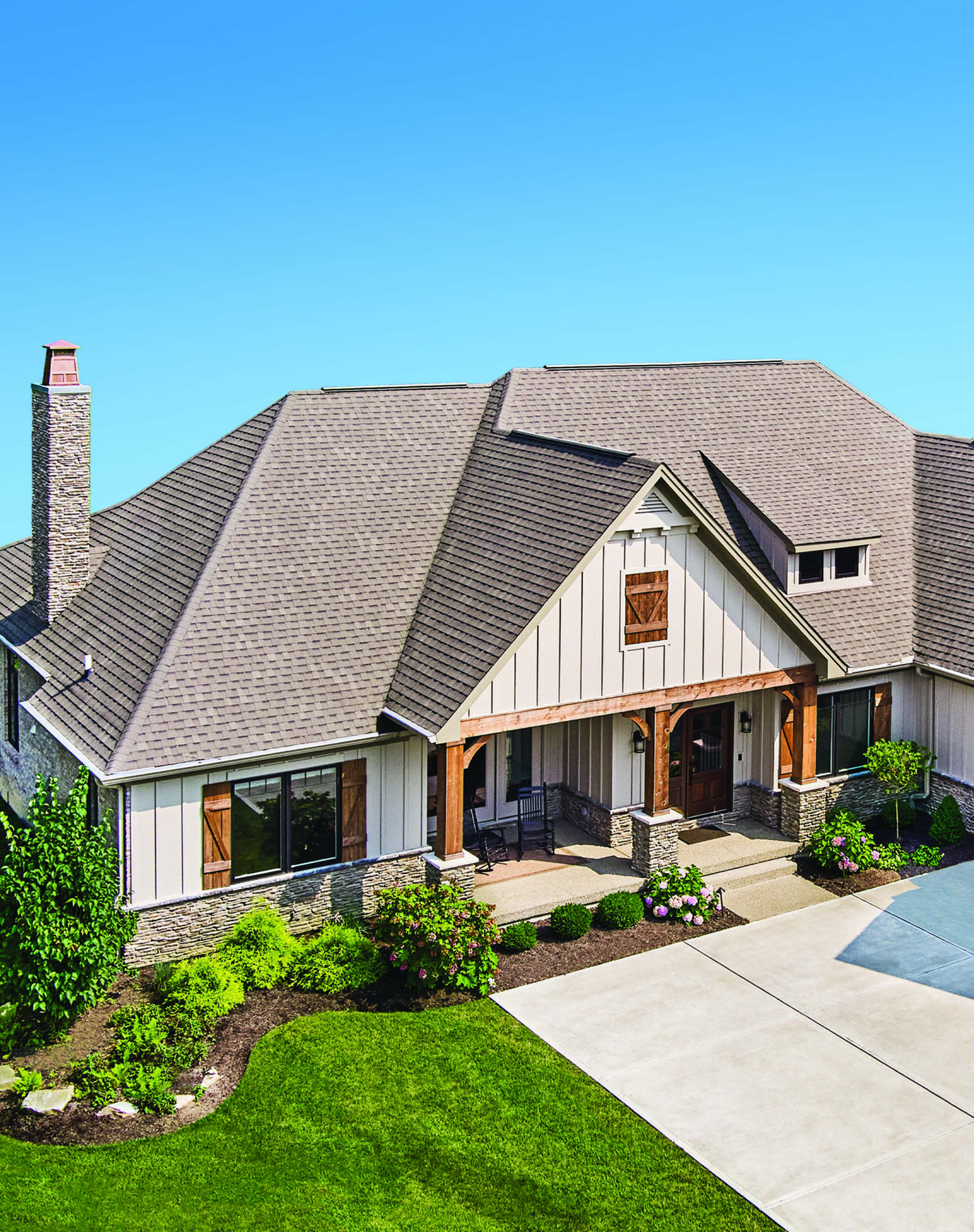 Completed home exterior featuring Atlas Pinnacle Pristine shingles. Manufacturer photograph.